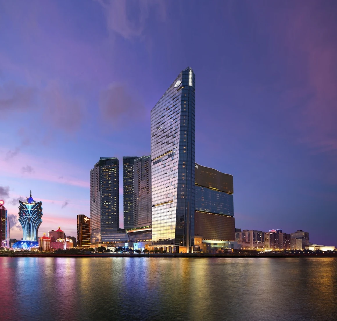 Mandarin Oriental Macau luxury hotel exterior overlooking Nam Van Lake skyline