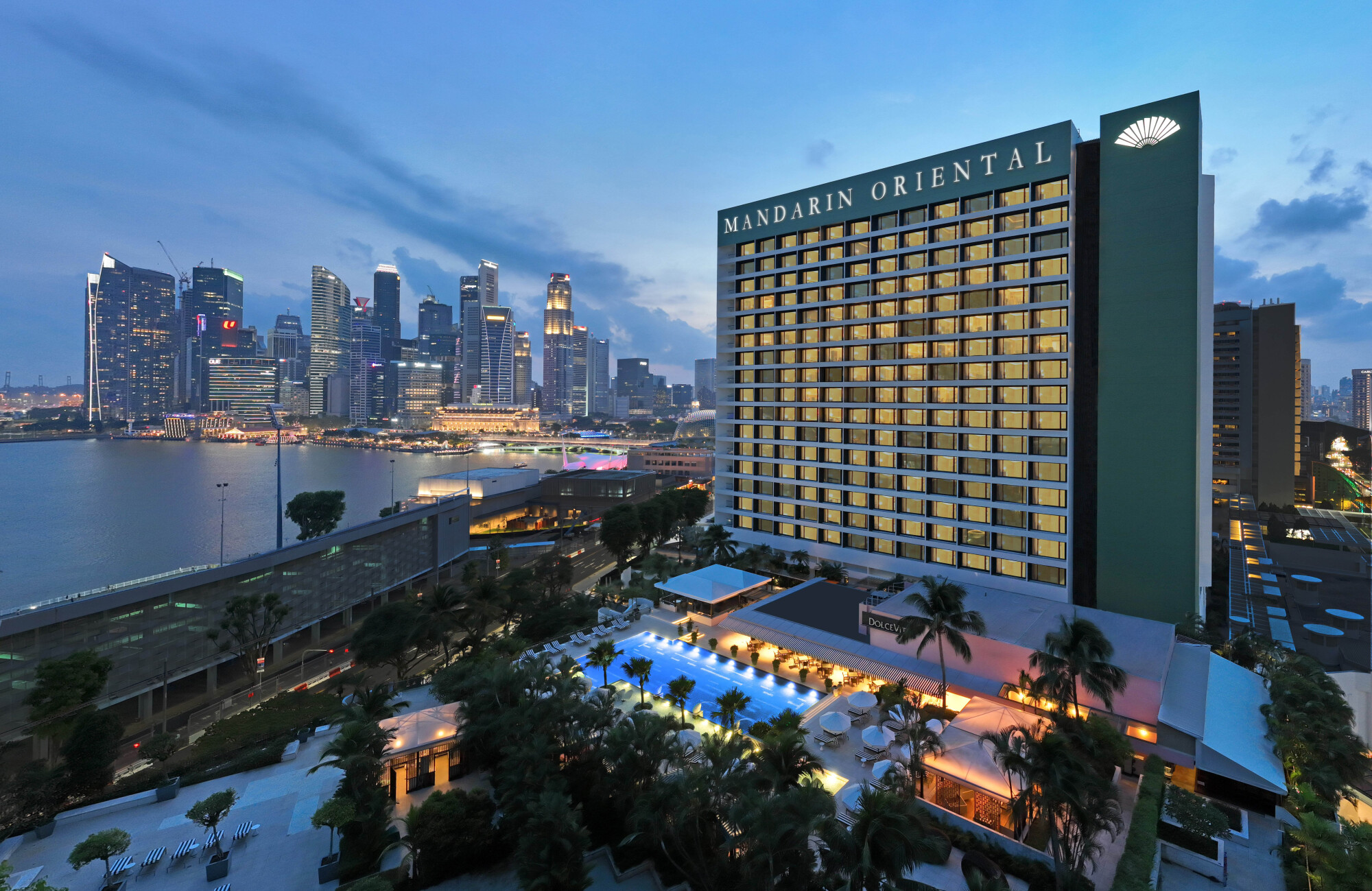 Mandarin Oriental Singapore with Marina Bay views and iconic skyline at sunset