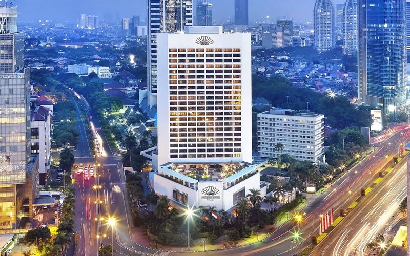 Mandarin Oriental Jakarta exterior with city skyline view in Central Jakarta
